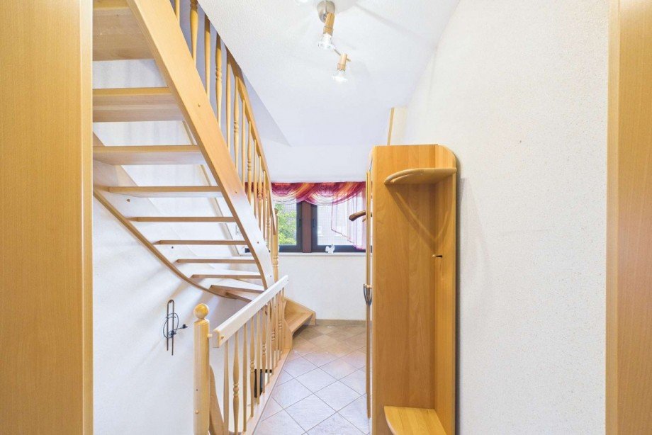Treppenaufgang in die ausgebaute Dachspitze Haus Wolfsburg